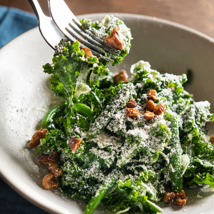 Organic Kale salad with House-made Lactic Cheese and Caramelized Nuts